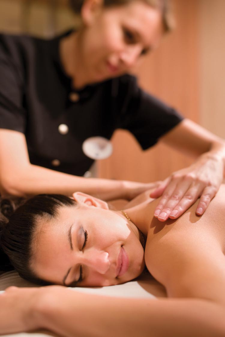 Woman enjoying massage treatment