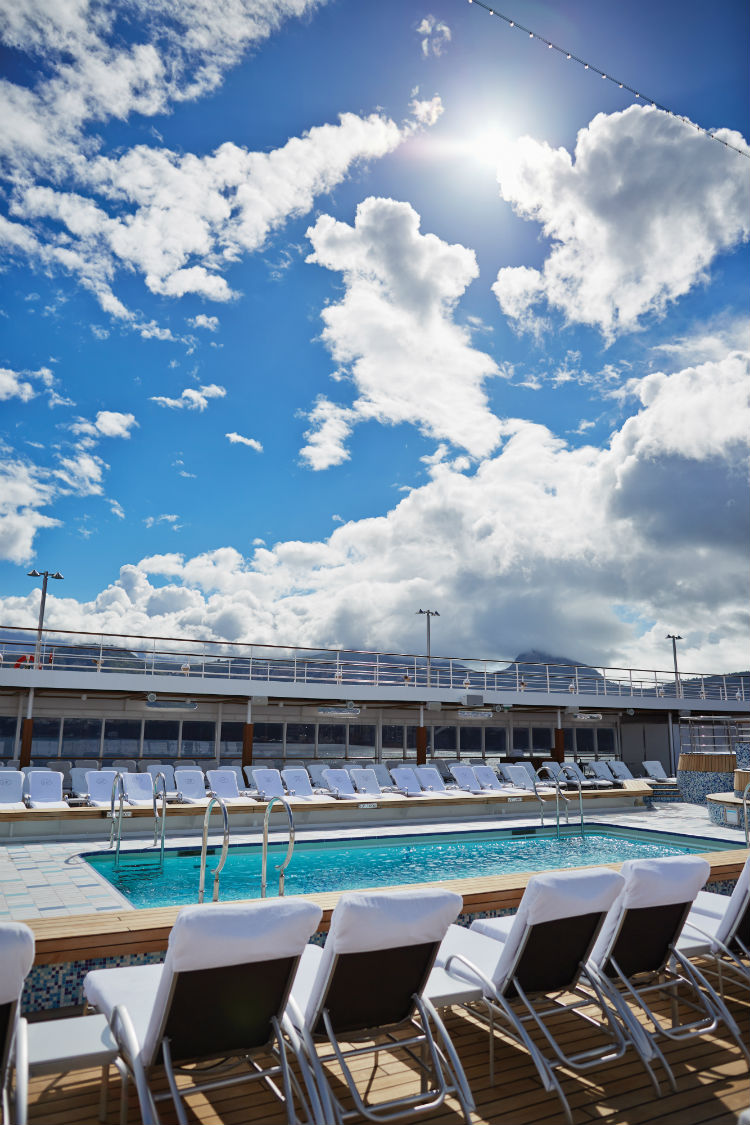 Sun shining onto the pool deck on-board Seven Seas Mariner