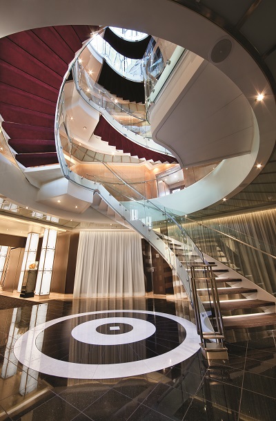 Staircase in the stunning atrium on-board a Seabourn cruise ship