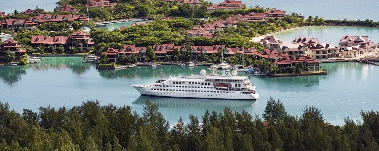 Crystal Esprit cruise ship sailing by Eden Island