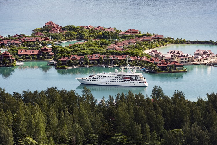 Crystal Esprit cruise ship sailing by Eden Island