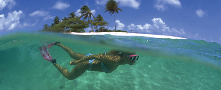 Woman snorkelling on holiday