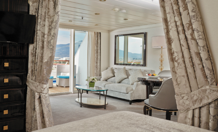 The living area of a sophisticated Horizon View Suite on-board Regent Seven Seas Mariner
